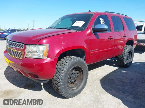 2007 Chevrolet Tahoe LT with VIN 1GNFC13037R231409, listed as a IAAI auction lot 42303972 with 82,550 mi miles and . Bid and sale history available at DreamBid. Image 2.