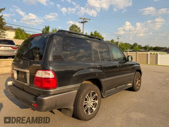 2004 Lexus LX 470 with VIN JTJHT00W44354386, listed as a Copart auction lot 63816455 with 389,442 mi miles and Clean title. Bid and sale history available at DreamBid. Image 4.