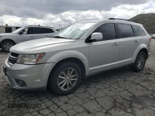 2014 Dodge Journey SXT with VIN 3C4PDCBB9ET161301, listed as a Copart auction lot 46789575 with 112,662 mi miles and Salvage Title. Bid and sale history available at carsss.com. Image 1.