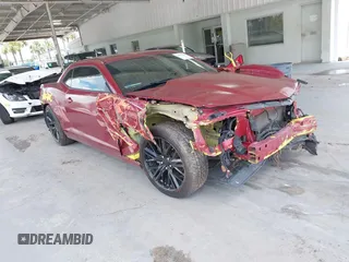 2014 Chevrolet Camaro LS z VIN 2G1FA1E39E9305745, wystawiony jako IAAI lot #42377623 z przebiegiem 99 502 mil mil oraz . Historia ofert i sprzedaży dostępna na DreamBid. Obrazek 1.