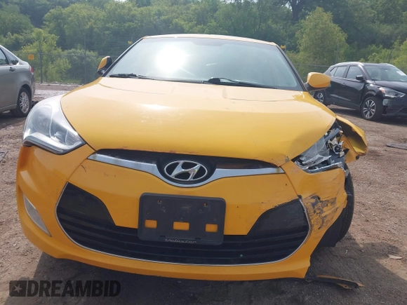 2013 Hyundai Veloster w/Black Int with VIN KMHTC6AD7DU161769, listed as a IAAI auction lot 42448221 with 139,936 mi miles and . Bid and sale history available at DreamBid. Image 12.
