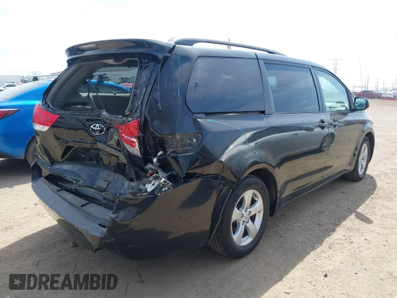 2014 Toyota Sienna LE AAS with VIN 5TDKK3DC6ES499478, listed as a IAAI auction lot 41918474 with 127,734 mi miles and . Bid and sale history available at carsss.com. Image 4.
