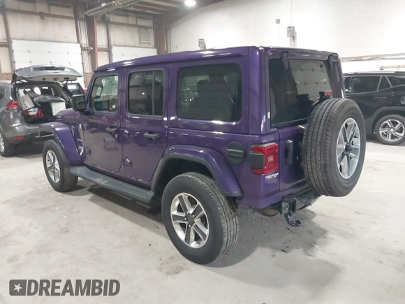 2023 Jeep Wrangler Sahara with VIN 1C4HJXEN9PW560958, listed as a IAAI auction lot 41980179 with 35,975 mi miles and . Bid and sale history available at DreamBid. Image 3.