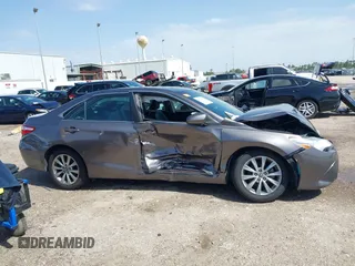 2015 Toyota Camry XLE with VIN 4T1BF1FK0FU952421, listed as a IAAI auction lot 41714622 with 125,553 mi miles and . Bid and sale history available at DreamBid. Image 13.
