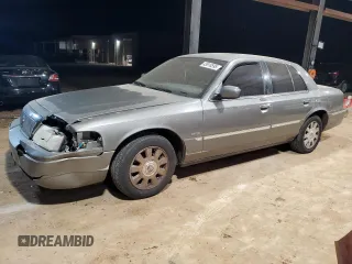 2003 Mercury Grand Marquis LS Premium with VIN 2MEHM75W03X658192, listed as a Copart auction lot 43818595 with 401,022 mi miles and Salvage Title. Bid and sale history available at DreamBid. Image 1.