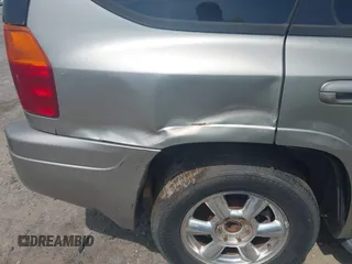 2003 GMC Envoy SLE z VIN 1GKDT13S632213799, wystawiony jako IAAI lot #42470437 z przebiegiem 289 728 mil mil oraz . Historia ofert i sprzedaży dostępna na DreamBid. Obrazek 11.