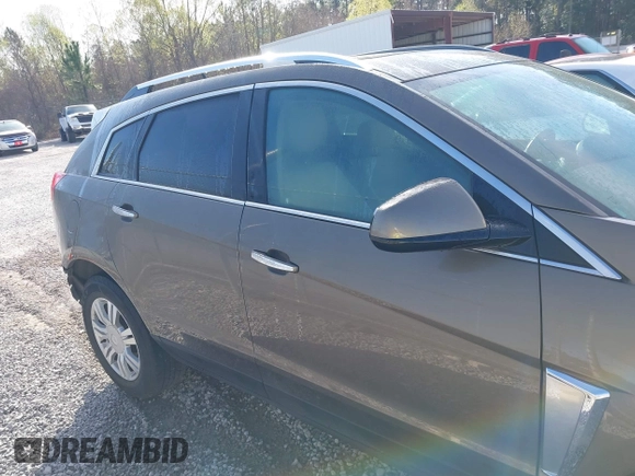 2014 Cadillac SRX Luxury Collection with VIN 3GYFNBE35ES658546, listed as a IAAI auction lot 41690861 with 66,263 mi miles. Bid and sale history available at carsss.com. Image 13.