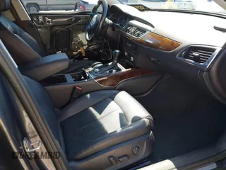 2014 Audi A6 3.0T Prestige with VIN WAUHGAFC9EN028196, listed as a IAAI auction lot 41993806 with 100,215 mi miles. Bid and sale history available at carsss.com. Image 5.