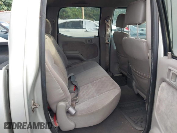 2003 Toyota Tacoma PreRunner z VIN 5TEGN92N63Z170929, wystawiony jako IAAI lot #41778256 z przebiegiem 202 135 mil mil oraz . Historia ofert i sprzedaży dostępna na DreamBid. Obrazek 8.