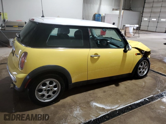 2002 MINI Hardtop z VIN WMWRC33412TE12203, wystawiony jako Copart lot #58246045 z przebiegiem 132 506 mil mil oraz Szkoda całkowita • Salvage title. Historia ofert i sprzedaży dostępna na DreamBid. Obrazek 3.