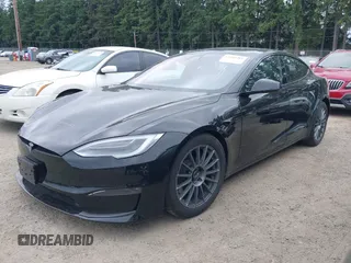 2021 Tesla Model S Plaid with VIN 5YJSA1E62MF447509, listed as a IAAI auction lot 42509281 with 32,372 mi miles and . Bid and sale history available at DreamBid. Image 20.