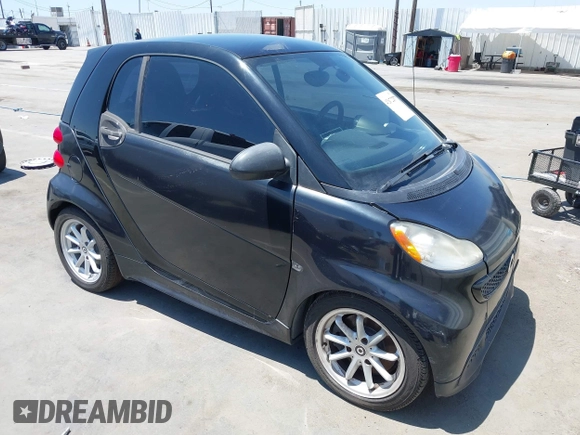 2014 Smart fortwo Pure with VIN WMEEJ3BA1EK752202, listed as a IAAI auction lot 42672207 with 65,736 mi miles and . Bid and sale history available at DreamBid. Image 1.