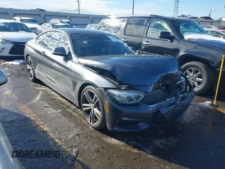 2015 BMW 4 Series 435i with VIN WBA3R1C54FK193845, listed as a IAAI auction lot 41293616 with 79,990 mi miles and . Bid and sale history available at carsss.com. Image 1.