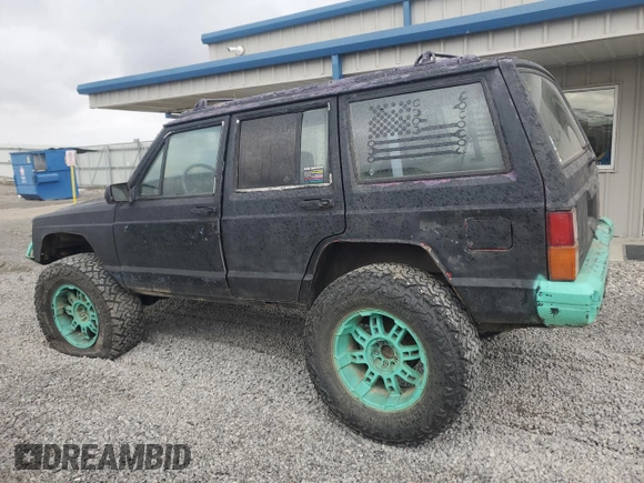 1993 Jeep Cherokee Sport with VIN 1J4FJ68S6PL506709, listed as a Copart auction lot 86638434 with 253,923 mi miles and Salvage Title. Bid and sale history available at carsss.com. Image 2.