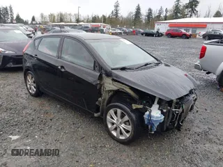 2013 Hyundai Accent SE with VIN KMHCU5AE9DU129485, listed as a IAAI auction lot 41958366 with 63,509 mi miles. Bid and sale history available at carsss.com. Image 1.