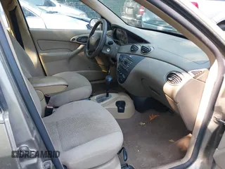 2004 Ford Focus SE z VIN 1FAFP36324W186481, wystawiony jako IAAI lot #42654016 z przebiegiem 168 331 mil mil oraz . Historia ofert i sprzedaży dostępna na DreamBid. Obrazek 5.