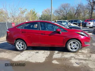 2017 Ford Fiesta SE z VIN 3FADP4BJ6HM143379, wystawiony jako IAAI lot #40863748 z przebiegiem 77 325 mil mil oraz . Historia ofert i sprzedaży dostępna na DreamBid. Obrazek 13.