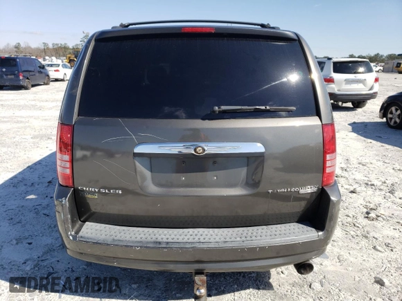 2010 Chrysler Town & Country LX with VIN 2A4RR4DE0AR309771, listed as a Copart auction lot 46296225 with 202,802 mi miles and Salvage Title. Bid and sale history available at DreamBid. Image 6.