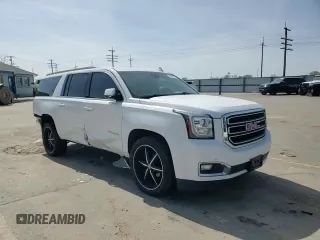 2016 GMC Yukon XL SLT with VIN 1GKS2GKC6GR228033, listed as a Copart auction lot 52450055 with 135,476 mi miles and Salvage Title. Bid and sale history available at DreamBid. Image 12.