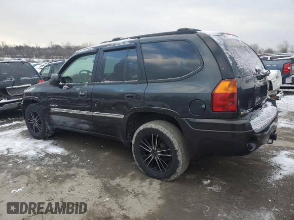 2006 GMC Envoy SLT with VIN 1GKDT13S562338202, listed as a Copart auction lot 87326504 with 158,468 mi miles and Clean Title. Bid and sale history available at carsss.com. Image 2.