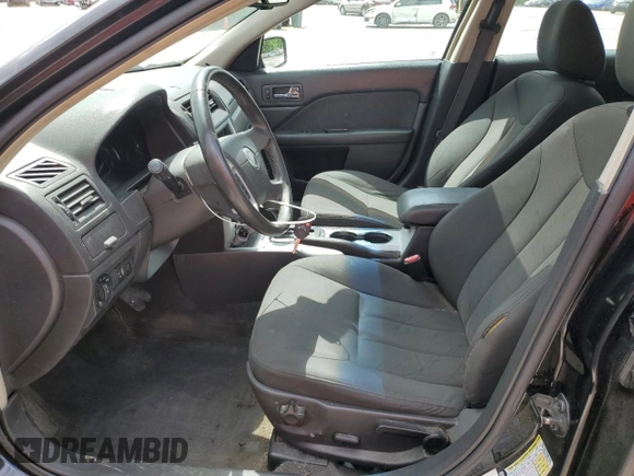 2010 Mercury Milan with VIN 3MEHM0HA4AR637476, listed as a Copart auction lot 57687715 with 114,894 mi miles and Salvage title. Bid and sale history available at DreamBid. Image 7.