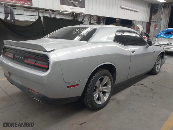 2021 Dodge Challenger SXT with VIN 2C3CDZAG8MH630713, listed as a IAAI auction lot 41825990 with 67,603 mi miles. Bid and sale history available at carsss.com. Image 4.