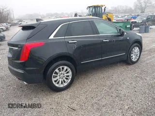 2018 Cadillac XT5 FWD with VIN 1GYKNARS6JZ160993, listed as a IAAI auction lot 41472847 with 113,415 mi miles. Bid and sale history available at carsss.com. Image 4.
