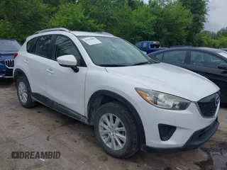 2014 Mazda CX-5 Sport z VIN JM3KE2BE0E0315670, wystawiony jako IAAI lot #42274205 z przebiegiem 183 545 mil mil oraz . Historia ofert i sprzedaży dostępna na DreamBid. Obrazek 1.