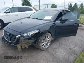 2017 Mazda 3 Touring with VIN 3MZBN1V71HM128842, listed as a IAAI auction lot 42314280 with 139,469 mi miles and . Bid and sale history available at DreamBid. Image 2.
