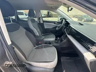 2022 Volkswagen Taos S z VIN 3VVCX7B29NM017370, wystawiony jako Copart lot #56599925 z przebiegiem 94 176 mil mil oraz Czysty tytuł • Clean title. Historia ofert i sprzedaży dostępna na DreamBid. Obrazek 5.