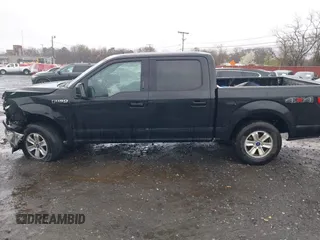 2020 Ford F-150 XL with VIN 1FTEW1EP7LFB03952, listed as a IAAI auction lot 42005565 with 95,847 mi miles and . Bid and sale history available at DreamBid. Image 14.