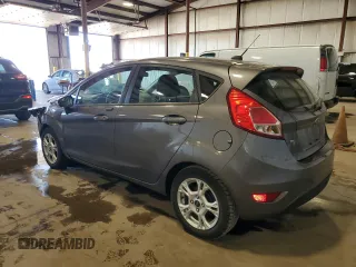 2014 Ford Fiesta SE with VIN 3FADP4EJ7EM232353, listed as a Copart auction lot 54680865 with 52,673 mi miles and Salvage Title. Bid and sale history available at DreamBid. Image 2.