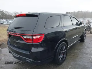 2019 Dodge Durango SRT with VIN 1C4SDJGJXKC550910, listed as a IAAI auction lot 41497932 with 62,541 mi miles and . Bid and sale history available at DreamBid. Image 4.