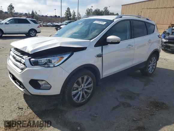 2018 Ford Escape Titanium with VIN 1FMCU0J9XJUA07221, listed as a Copart auction lot 43758165 with 68,805 mi miles and Salvage title. Bid and sale history available at DreamBid. Image 1.