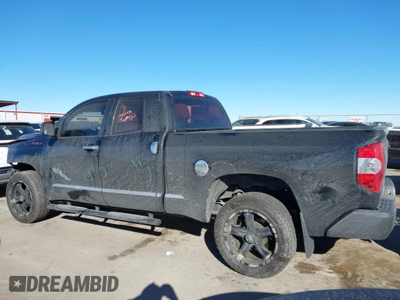 2014 Toyota Tundra 4WD Truck SR with VIN 5TFUM5F17EX051674, listed as a IAAI auction lot 41296906 with 140,782 mi miles. Bid and sale history available at carsss.com. Image 14.