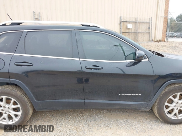 2014 Jeep Cherokee Latitude with VIN 1C4PJLCB4EW175236, listed as a IAAI auction lot 40788919 with 174,324 mi miles and . Bid and sale history available at DreamBid. Image 13.