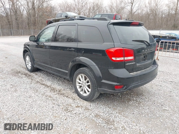 2014 Dodge Journey SXT with VIN 3C4PDCBG1ET142687, listed as a IAAI auction lot 41698232 with 170,521 mi miles. Bid and sale history available at carsss.com. Image 3.