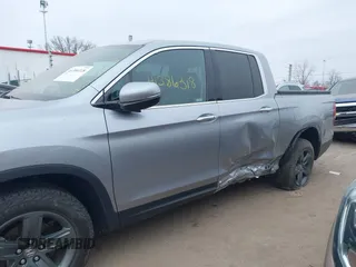 2021 Honda Ridgeline RTL-E with VIN 5FPYK3F79MB010091, listed as a IAAI auction lot 41386318 with 37,996 mi miles and . Bid and sale history available at DreamBid. Image 6.