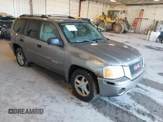 2005 GMC Envoy SLE z VIN 1GKDT13S752226502, wystawiony jako IAAI lot #42021800 z przebiegiem 233 165 mil mil oraz . Historia ofert i sprzedaży dostępna na DreamBid. Obrazek 1.