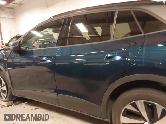 2023 Volkswagen ID.4 Pro z VIN 1V2DNPE84PC038042, wystawiony jako IAAI lot #41446269 z przebiegiem 12 878 mil mil oraz . Historia ofert i sprzedaży dostępna na DreamBid. Obrazek 15.