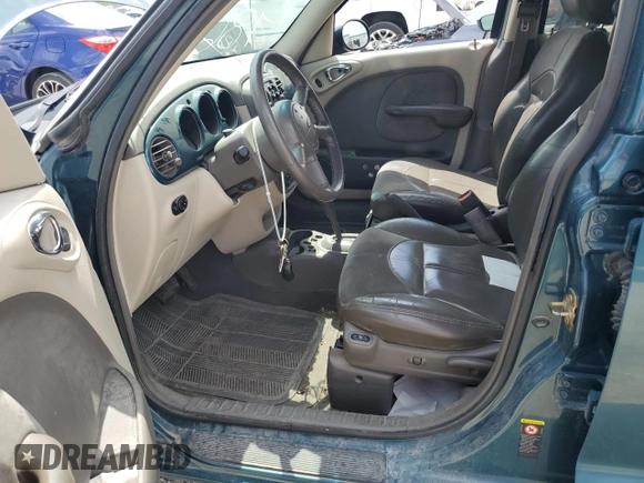 2001 Chrysler PT Cruiser with VIN 3C8FY4BB71T631808, listed as a Copart auction lot 62169635 with 136,216 mi miles and Salvage title. Bid and sale history available at DreamBid. Image 7.