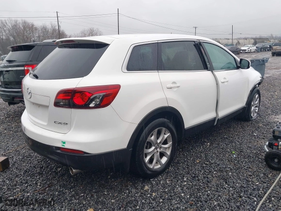 2015 Mazda CX-9 Touring with VIN JM3TB2CA1F0449033, listed as a IAAI auction lot 41549205 with 95,106 mi miles. Bid and sale history available at carsss.com. Image 4.