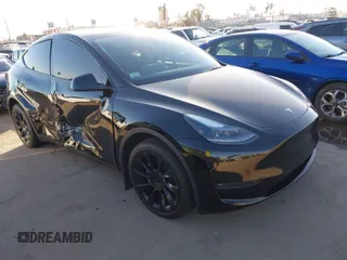 2024 Tesla Model Y Long Range with VIN 7SAYGDEEXRA216186, listed as a IAAI auction lot 41106653 with 25,331 mi miles and . Bid and sale history available at DreamBid. Image 1.