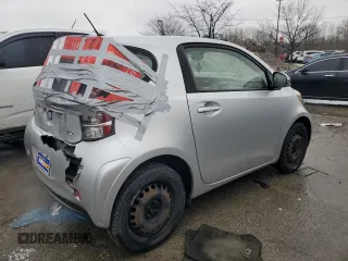 2013 Scion iQ with VIN JTNJJXB08DJ025554, listed as a Copart auction lot 88923885 with 110,378 mi miles and Salvage title. Bid and sale history available at DreamBid. Image 3.