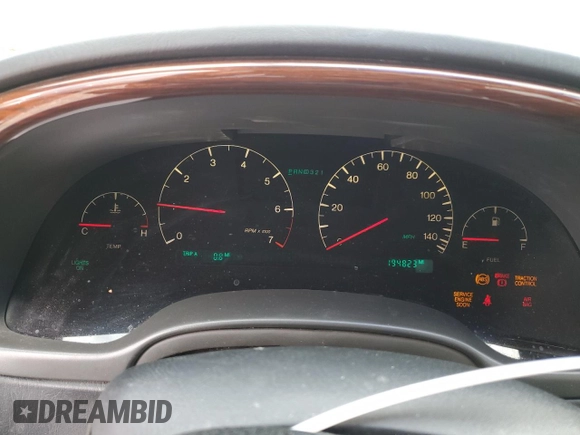 2004 Cadillac DeVille DTS z VIN 1G6KF57944U253624, wystawiony jako Copart lot #49444905 z przebiegiem 174 823 mil mil oraz Szkoda całkowita • Salvage title. Historia ofert i sprzedaży dostępna na DreamBid. Obrazek 9.