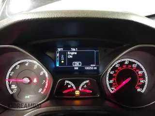 2014 Ford Focus ST with VIN 1FADP3L91EL375674, listed as a IAAI auction lot 41572329 with 100,253 mi miles and . Bid and sale history available at carsss.com. Image 7.