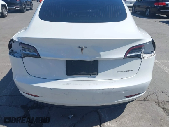 2020 Tesla Model 3 Long Range z VIN 5YJ3E1EB3LF621348, wystawiony jako IAAI lot #42121895 z przebiegiem Nie podano mil oraz . Historia ofert i sprzedaży dostępna na DreamBid. Obrazek 6.