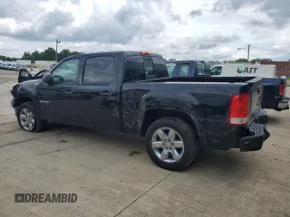 2013 GMC Sierra 1500 SLT with VIN 3GTP2WE72DG197661, listed as a Copart auction lot 60703615 with 132,503 mi miles and Salvage title. Bid and sale history available at DreamBid. Image 2.