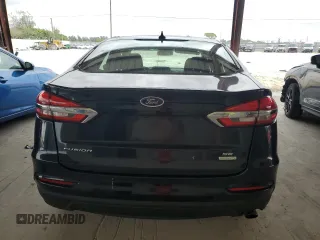2020 Ford Fusion SE с VIN 3FA6P0HD5LR161189, выставлен на аукционе Copart как лот 62369585 с пробегом 100 440 миль миль и Списание • Salvage title. История ставок и продаж доступна на DreamBid. Изображение 6.