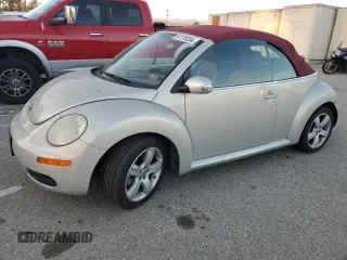 2009 Volkswagen Beetle Blush with VIN 3VWSG31Y59M411802, listed as a Copart auction lot 87279204 with 70,425 mi miles and Clean title. Bid and sale history available at DreamBid. Image 1.